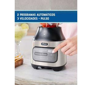 Licuadora Oster® tecnología reversible, 2 programas automáticos y 3 velocidades más pulso