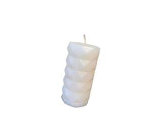 Vela decorativa con forma de cirio tridimensional.12 cm x 6 cm