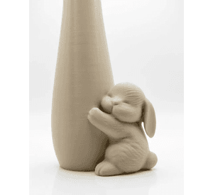 Jarrón de Pascua con conejo abrazando